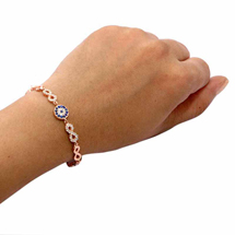 EVIL EYE ROSE COLORED INFINITY AND ROUND BRACELET