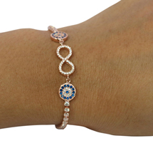 EVIL EYE ROSE COLORED INFINITY BRACELET