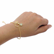 EVIL EYE GOLD PLATED CHARM BRACELET